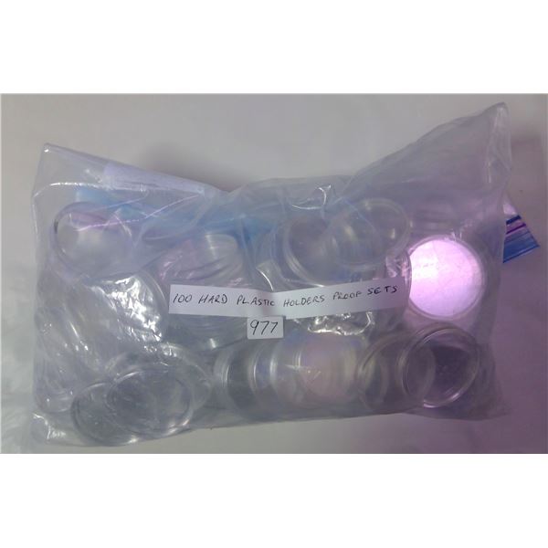 100 Hard Plastic Holders for coins. All are from Proof Sets.