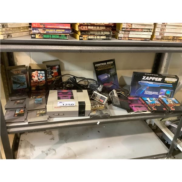 NINTENDO ENTERTAINMENT SYSTEM, 2 CONTROLLERS, ZAPPER GUN, AND ASSORTED GAMES: DUCK HUNT, MARIO