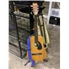 Image 1 : SUZUKI ACOUSTIC GUITAR WITH STEEL REINFORCED NECK AND ADJUSTABLE GUITAR STAND