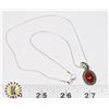 Image 1 : 26)  TIBETAN SILVER AND RED CARNELIAN OVAL