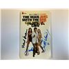 Image 1 : Roger Moore Autograph  Autograph Signed Man With The Golden Gun Book