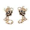 Image 2 : Chanel Silver-tone CC Camellia Earrings