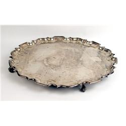 AN ENGLISH SILVER CIRCULAR FOOTED TRAY