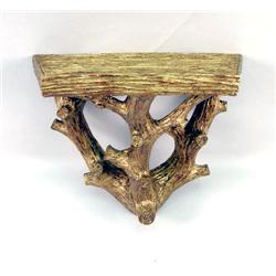 A GILT-DECORATED COMPOSITE TWIG-FORM HANGING WALL BRACKET