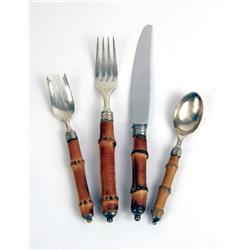 A SET OF BUCCELATTI "TAHITI" PATTERN STERLING SILVER WITH BAMBOO HANDLED DINNER KNIVES AND FORKS