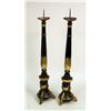 Image 1 : A PAIR OF LARGE BLACK-PAINTED AND PARCEL-GILT PRICKET-STYLE TORCHIERES