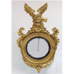 A CLASSICAL GEORGE III CONVEX GILTWOOD MIRROR
