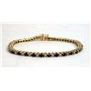 Image 1 : A 14K YELLOW GOLD DIAMOND AND SAPPHIRE LINE BRACELET