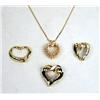 Image 1 : FOUR YELLOW GOLD AND DIAMOND HEART-FORM PENDANTS