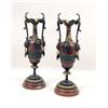 Image 1 : A PAIR OF NEOCLASSICAL-STYLE PORPHYRY AND PATINATED BRONZE GILT-METAL MOUNTED CANDLE HOLDERS