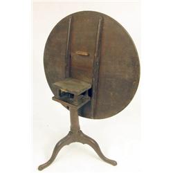 A GEORGE III MAHOGANY TILT-TOP BIRDCAGE TEA TABLE