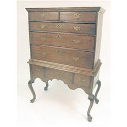 A GEORGE III OAK HIGHBOY