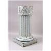 Image 1 : A WHITE GLAZED TERRACOTTA COLUMNAR-FORM GRYPHON MOTIF PEDESTAL