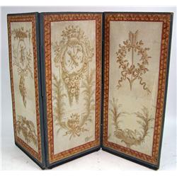 A PAINTED AND POLYCHROME-DECORATED THREE-PANEL FOLDING SCREEN