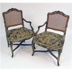 A PAIR OF REGENCE PAINTED AND CARVED BEECHWOOD CANED FAUTEUIL
