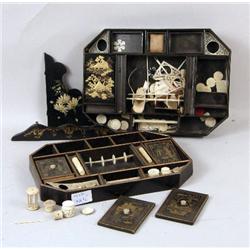 A PARTIAL CHINESE BLACK LACQUER AND GILT SEWING KIT