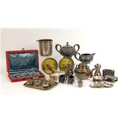 A BOXED SET OF GILT-METAL DEMI-TASSE SPOONS AND SUGAR TONGS