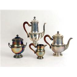A SILVER-PLATED FOUR PIECE TEA AND COFFEE SERVICE