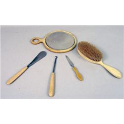 A VINTAGE FAUX-IVORY DRESSING SET