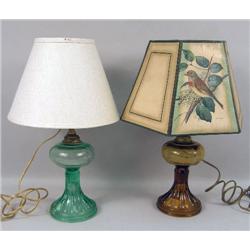 TWO SIMILAR OIL LAMPS