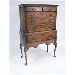 A QUEEN ANNE FIGURED MAPLE HIGH CHEST OF DRAWERS