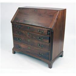A CHIPPENDALE FIGURED WALNUT SLANT-FRONT DESK