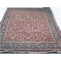 AN ORIENTAL CARPET