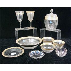 A LARGE MISCELLANEOUS ASSORTMENT OF PARCEL-GILT-DECORATED COLORLESS GLASS
