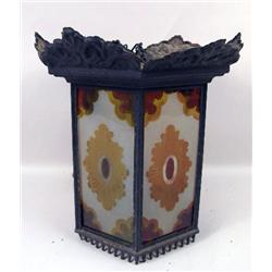 A HANGING TIN LANTERN WITH PAINTED GLASS PANELS