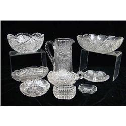 A LARGE GROUP OF CUT CRYSTAL ITEMS