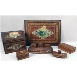 AN ASSEMBLED ITALIAN RENAISSANCE-STYLE STAMPED LEATHER AND GILT DESK SET