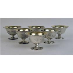 A SET OF TWELVE AMERICAN STERLING SILVER SHEBERT CUPS