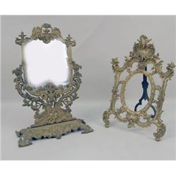 A ROCOCO-STYLE GILT METAL EASEL-BACK FRAME