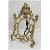 Image 2 : A ROCOCO-STYLE GILT METAL EASEL-BACK FRAME