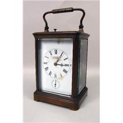 A BRONZE CARRIAGE CLOCK