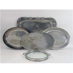 A GROUP OF FIVE SILVER-PLATED TRAYS