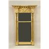 Image 1 : A CLASSICAL GILTWOOD TWO-PART LOOKING GLASS