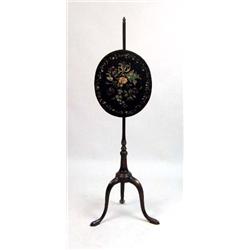 A GEORGE III MAHOGANY FIRE SCREEN