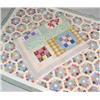 Image 1 : A HAND-STITCHED PIECED COTTON QUILT
