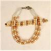 Image 1 : A THREE STRAND WHITE, PINK AND MAUVE PEARL NECKLACE