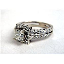 A 14K WHITE GOLD AND DIAMOND RING