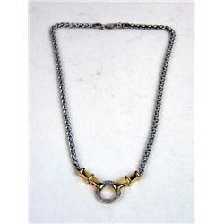 A STERLING SILVER 14Y YELLOW GOLD AND DIAMOND NECKLACE