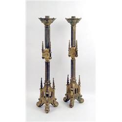 A PAIR OF VICTORIAN CAST-BRASS GOTHIC REVIVAL CANDLESTICKS