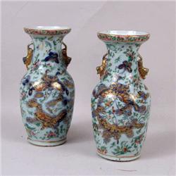 A PAIR OF CHINESE POLYCHROME AND PARCEL-GILT DECORATED PORCELAIN URNS