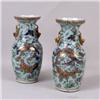 Image 1 : A PAIR OF CHINESE POLYCHROME AND PARCEL-GILT DECORATED PORCELAIN URNS