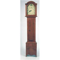 A STAINED PINE TALL CASE CLOCK