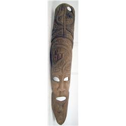 A CARVED TRIBAL HARDWOOD MASK