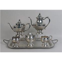 AN AMERICAN SILVER FIVE PIECE TEA AND COFFEE SERVICE WITH MATCHING DOUBLE-HANDLED TEA TRAY