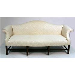A CHIPPENDALE-STYLE CAMELBACK SOFA