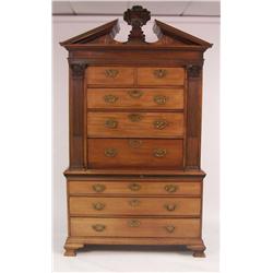A GEORGE II CARVED AND FIGURED MAHOGANY CHEST ON CHEST SECRETAIRE